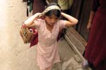 08_little_girl_carries_sibling_at_border