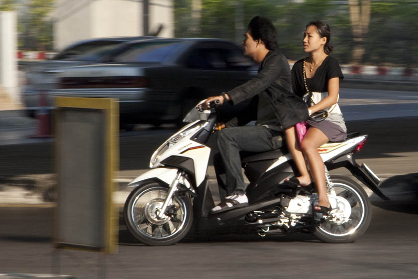 girl  on Bangkok motorcycle 