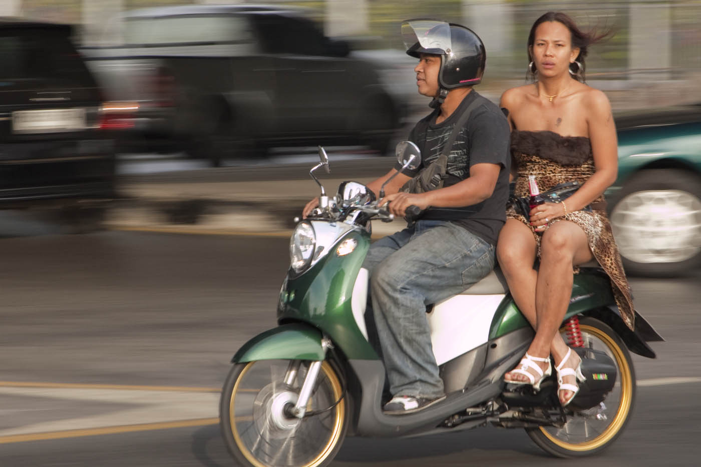 a transgendered person takes a motorcycle home after a long night of drinking